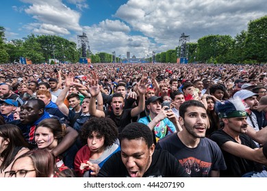 Paris, FRANCE - June 28, 2016 : Crowd of supporters inside the fan zone of the Eiffel Tower during the match between France and Ireland for the Euro 2016. 