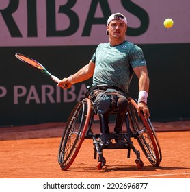 PARIS, FRANCE - JUNE 5, 2022: Argentinian Wheelchair Tennis Player Gustavo Fernandez In Action During His Wheelchair Men's Singles Final Match Against Shingo Kunieda At 2022 Roland Garros In Paris