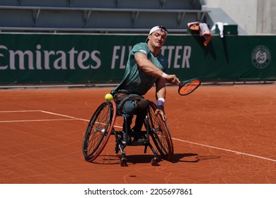 PARIS, FRANCE - JUNE 5, 2022: Argentinian Wheelchair Tennis Player Gustavo Fernandez In Action During His Wheelchair Men's Singles Final Match Against Shingo Kunieda At 2022 Roland Garros In Paris