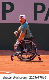 PARIS, FRANCE - JUNE 5, 2022: Argentinian Wheelchair Tennis Player Gustavo Fernandez In Action During His Wheelchair Men's Singles Final Match Against Shingo Kunieda At 2022 Roland Garros In Paris