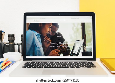 PARIS, FRANCE - MAR 10, 2015: Apple Computers Website On MacBook Retina In Room Environment Showcasing The AirDrop With MacBook Section  As Seen On 10 March, 2015