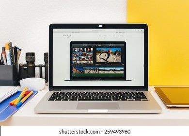 PARIS, FRANCE - MAR 10, 2015: Apple Computers website on MacBook Retina in room environment showcasing new MacBook iMovie app as seen on 10 March, 2015