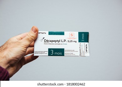 Paris, France - Mar 10, 2018: POV Male Hand Howlind Against White Background Decapeptyl L.P. 11.25 MG A Medication That Acts As Agonist Analog Of Gonadotropin-releasing Hormone - Prostate Cancer Cure