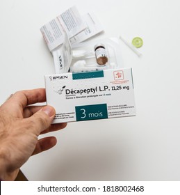 Paris, France - Mar 10, 2018: POV Male Hand Howlind Against White Background Decapeptyl L.P. 11.25 MG A Medication That Acts As Agonist Analog Of Gonadotropin-releasing Hormone - Prostate Cancer Cure