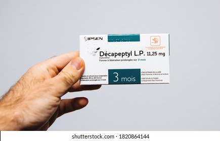 Paris, France - Mar 10, 2018: POV Male Hand Howlind Against White Background Decapeptyl L.P. 11.25 MG A Medication That Acts As Agonist Analog Of Gonadotropin-releasing Hormone - Prostate Cancer Cure