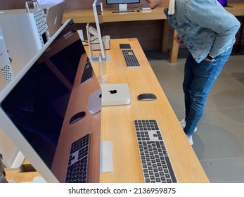 Paris, France - Mar 18, 2022: Young Man Customer Looking At The New Studio Display And Mac Studio M1 Ultra During The Sales Launch At The Apple Inc. Flagship Store Of New Apple SE 3 Smartphone, IPad