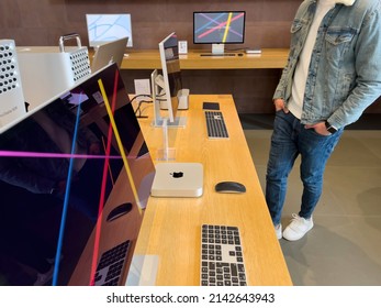 Paris, France - Mar 18, 2022: Young Man Customer Looking At The New Studio Display And Mac Studio M1 Ultra During The Sales Launch At The Apple Inc. Flagship Store Of New Apple SE 3 Smartphone, IPad