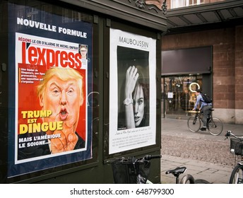 PARIS, FRANCE - MAR 23, 2017: French L'Express Magazines Cover Wtih Donald Trum Is Craxy Cover At Press Kiosk Newsstand (Trump Est Dingue In French)