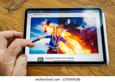 Paris, France - Mar 27, 2019: POV Personal Perspective On Apple Arcade Webpage Seen On Modern IPad Pro Tablet Featuring The New Subscription Model With Oceanhorn 2 Game