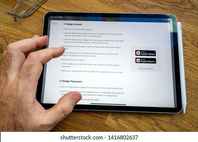 Paris, France - Mar 27, 2019: POV Personal Perspective On Apple News Webpage Seen On Modern IPad Pro Tablet Featuring Identity Guidelines