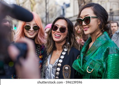 PARIS, FRANCE - MARCH 02, 2017: Kriselle Lim, Irene Kim and Amee Song pose wearing Balmain before the Balmain show  during Paris Fashion Week Womenswear FW 17/18