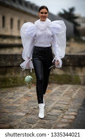 Paris, France - March 03 2019: Paris Fashion Week Street Style  Fall/Winter 2019/2020 Guest Outside Valentino