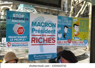 Paris, France - March 19, 2019: Posters Of La France Insoumise Against Emmanuel Macron. Translated As 