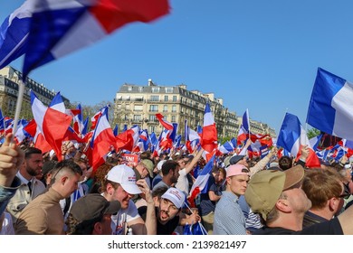 Paris, France - march 27 2022: crowd with french flags at the far right nationalist political rally of Eric Zemmour presidential candidate on Place du Trocadéro
