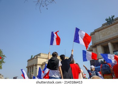 Paris, France - march 27 2022 : crowd of french people waving french flags at political rally on Trocadéro's square , patriotic pride