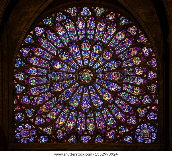 Paris, France - March 29, 2019: The rose window\
of Notre Dame cathedral