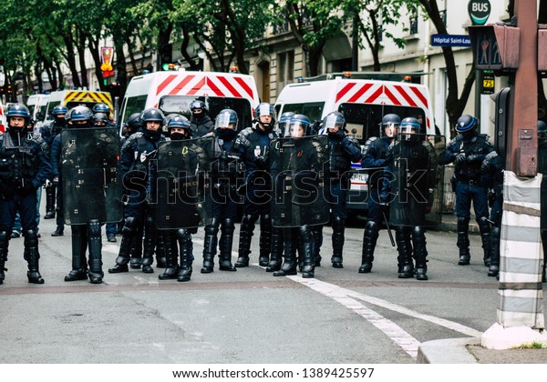 Paris France May 04, 2019 View of a riot squad\
of the French National Police in intervention during protests of\
the Yellow Jackets against the policy of President Macron in Paris\
on saturday afternoon