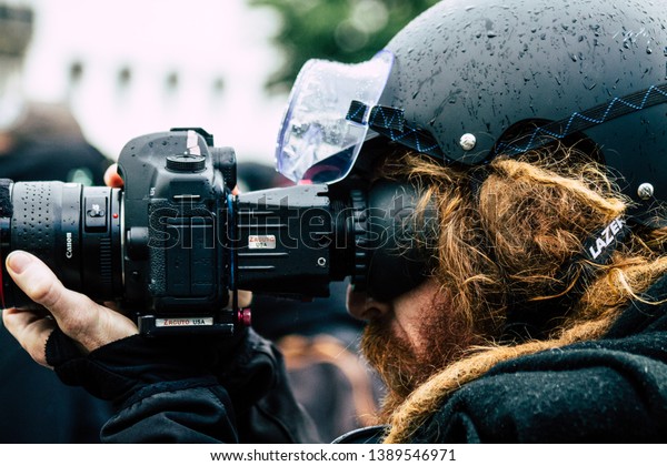 Paris France May 04, 2019 View of
press journalist covering protests of the Yellow Jackets against
the policy of President Macron in Paris on saturday
afternoon