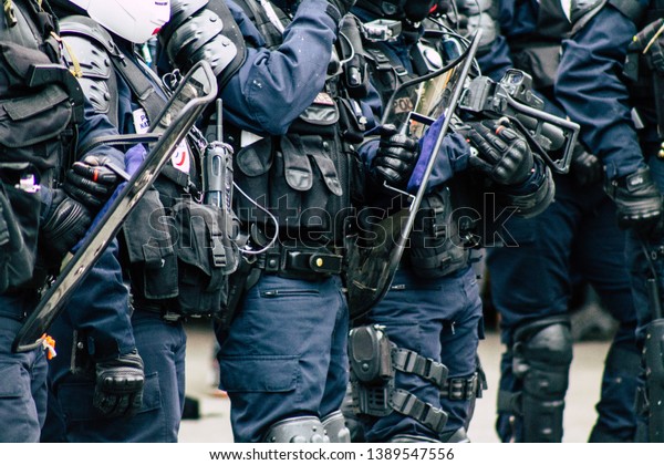 Paris France May 04, 2019 View of a riot squad\
of the French National Police in intervention during protests of\
the Yellow Jackets against the policy of President Macron in Paris\
on saturday afternoon