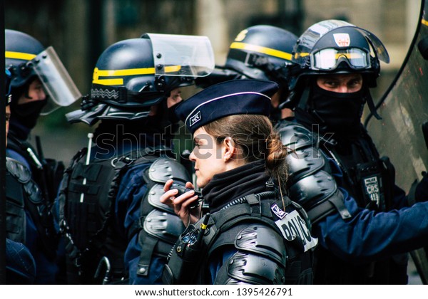 Paris France May 11, 2019 Portrait of a riot squad of
the French National Police in intervention during protests of the
Yellow Jackets against the policy of President Macron in Paris on
saturday 
