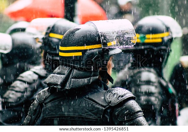 Paris France May 11, 2019 Portrait of a riot squad of\
the French National Police in intervention during protests of the\
Yellow Jackets against the policy of President Macron in Paris on\
saturday 