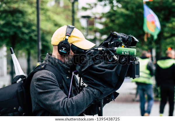 Paris France May 11, 2019 View of\
press journalist covering protests of the Yellow Jackets against\
the policy of President Macron in Paris on saturday\
afternoon