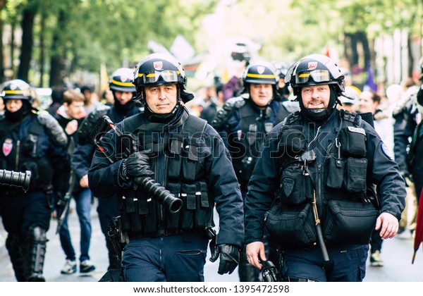Paris France May 11, 2019 View of a riot squad\
of the French National Police in intervention during protests of\
the Yellow Jackets against the policy of President Macron in Paris\
on saturday afternoon