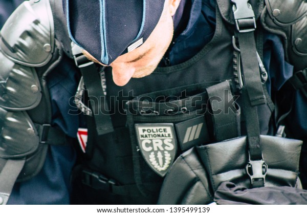 Paris France May 11, 2019 Close up of a uniform\
of French National Police in intervention during protests of the\
Yellow Jackets against the policy of President Macron in Paris on\
saturday afternoon