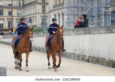 Paris, France - May 12, 2016. Mounted Police Near The Louvre In Paris.