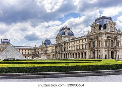 PARIS, FRANCE - MAY 14, 2014: View of Louvre building from Tuileries garden. Louvre Museum is one of the largest and most visited museums worldwide.