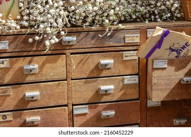 Paris, France , May 15 2022 : Flea Market Items Apothecary Furniture