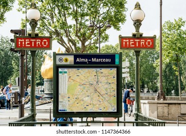 PARIS, FRANCE - MAY 21, 2016: Alma-Marceau Paris Metro Station Entrance With Map Of Paris And Vintage Lamp Post In Central Historic Part Of - Transportation Public