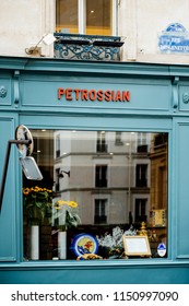 PARIS, FRANCE - MAY 21, 2016: Blue Facade Of Petrossian Fish Caviar Restaurant Paris In Central Paris