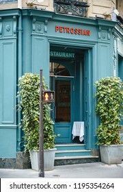 PARIS, FRANCE - MAY 21, 2016: Blue Facade Of Petrossian Fish Caviar Restaurant In Central Paris