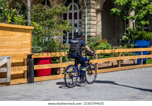 Paris, France - May\
21, 2022 Police in the streets of Paris during the coronavirus\
outbreak hitting France