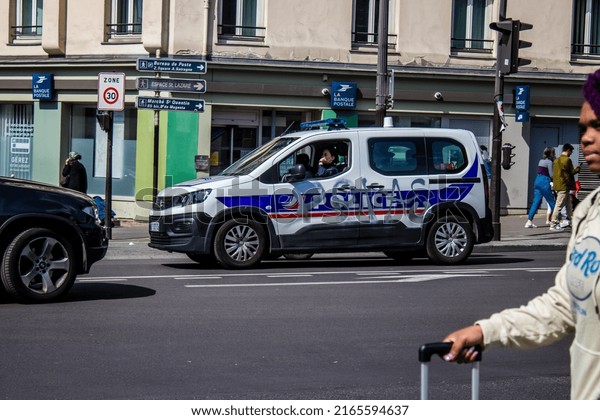 Paris, France - May\
21, 2022 Police in the streets of Paris during the coronavirus\
outbreak hitting France