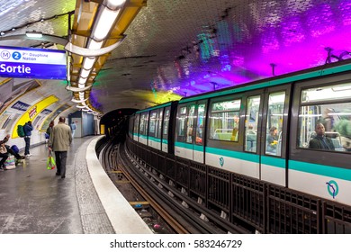 PARIS, FRANCE - MAY 25, 2016: Train On Platform On Parisian Metro Station - Rapid Transit System Opened In 1900, Has 16 Lines, 303 Stations And It Is The Second Busiest Subway In Europe.