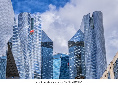 PARIS, FRANCE - MAY 28, 2019: Famous biggest business district in France – La Defense to west of Paris. Skyscrapers of the headquarters of the French Bank Societe Generale in the background.