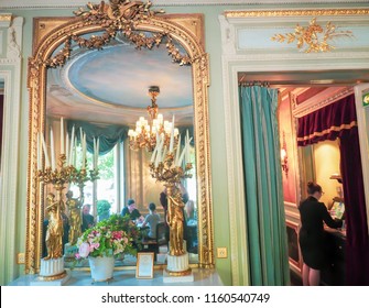 PARIS, FRANCE - MAY 30, 2018: Laduree Store On The Champs-Elysees Avenue. French Style Living Room With Huge Mirror In Golden Frame