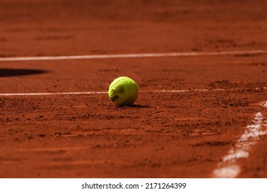 PARIS, FRANCE - MAY 30, 2022: Wilson Roland Garros tennis ball at Le Stade Roland Garros in Paris, France. Wilson is an Official Partner of the tournament and provides racquets, balls, strings