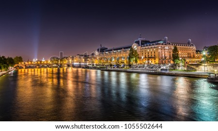 Paris, France. Night view of the dOrsay Museum and the Seine river