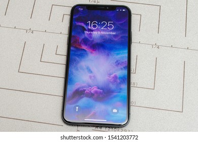 Paris, France - Nov 11, 2017: Latest Apple Computers IPhone 11 Pro Featuring Motion Screensaver Wallpaper On The Home Screen