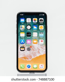 PARIS, FRANCE - NOV 5, 2017: New Apple IPhone X 10 Smartphone Isolated White Background With Home Screen Apps 