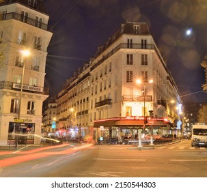 Paris, France - November 12, 2021: Old streets of Montmartre at night in Paris, France.