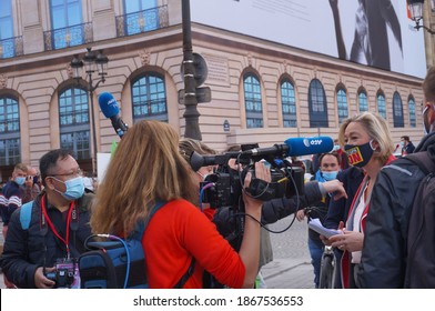 Paris, France - Oct. 10, 2020 - The President of La Manif pour Tous (LMPT), Ludovine de la Rochère, surrounded by journalists, is interviewed at Marchons Enfants' demonstration against eugenism