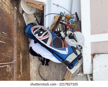 Paris, France- Oct 18, 2022: Directly Above View Of Throw Away Golf Club Bag In Dumpster- Recycling Old Objects