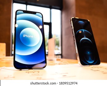 Paris, France - Oct 23, 2020: Hero object of the new iPhone 12 and iPhone 12 Pro on display during launch day in Apple Store. Latest 5G smartphones go on sale worldwide.