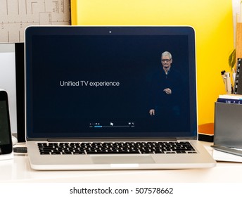 PARIS, FRANCE - OCT 28 2016: Apple Computers Website On New MacBook Pro Retina With OLED Touch Bar In Geek Creative Room  Keynote - Tim Cook About Unified TV Experience