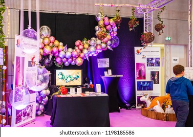 PARIS, FRANCE - OCT 6, 2018: Wedding Exhibition Paris 2018 With People - Customers And Exhibitions Preparing For The Marriage Event Booth Selling Baloons