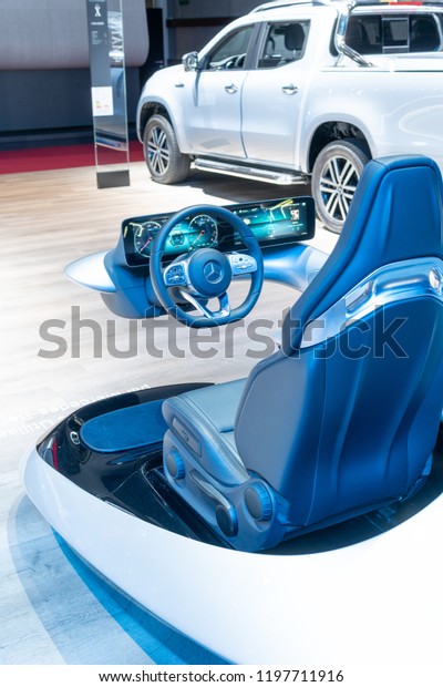 Paris, France, October 02, 2018: driving simulator,\
cockpit with intuitive and intelligent multimedia system MBUX -\
Mercedes-Benz User Experience at Mondial Paris Motor Show, produced\
by Mercedes Benz
